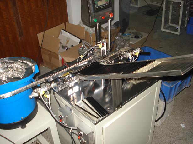 自動裝殼機(jī)